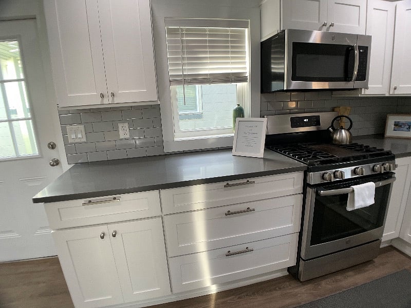 Kitchen.
Fully stocked with dishes, silverware, pots and pans, coffee makers, dishwasher, full sized refrigerator, range, microwave.