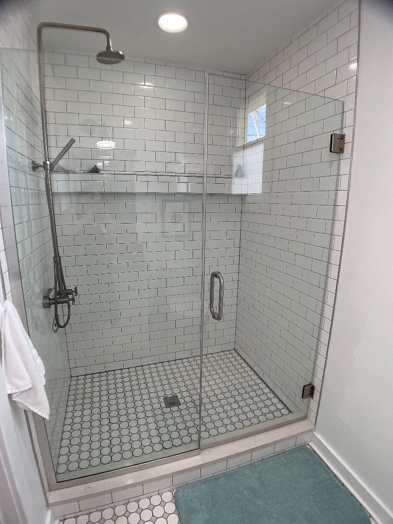 Full bathroom.
Spacious walk in shower with rain shower head.