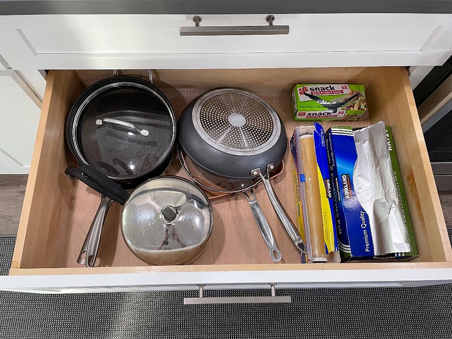 Kitchen.
Fully stocked with dishes, silverware, pots and pans, coffee makers, dishwasher, full sized refrigerator, range, microwave.