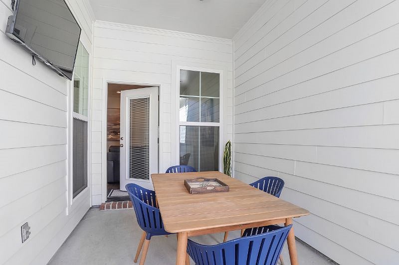 Private gated Patio with mounted 55" TV