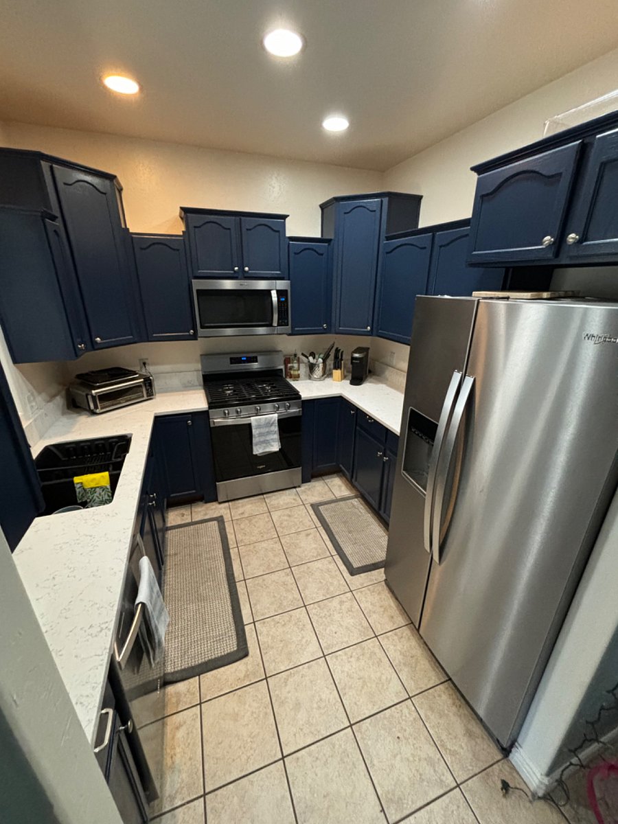 Fully stocked kitchen. Stainless steel appliances. Quartz countertops. 