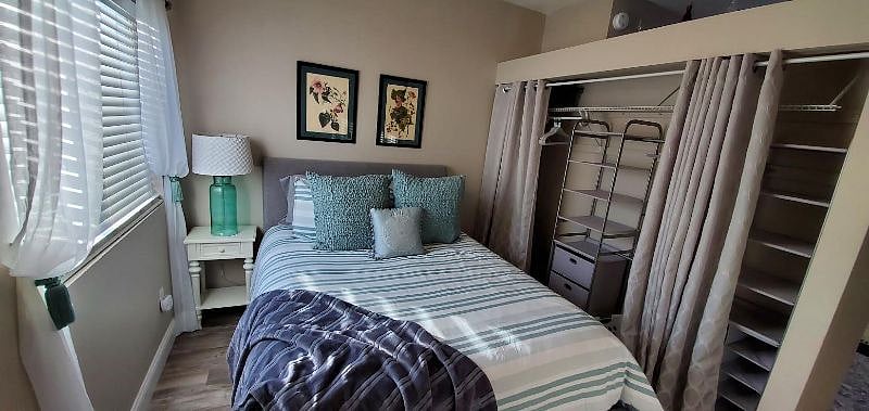 Bedroom has new Ceiling fan with remote and optional blackout curtains.