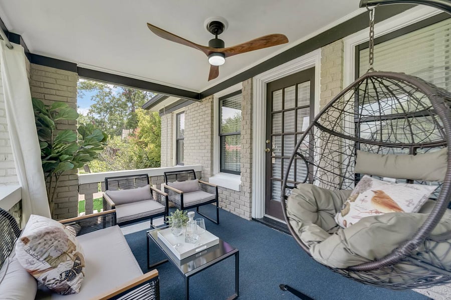 Private balcony with comfortable seating and plenty of space for both relaxing and entertaining.