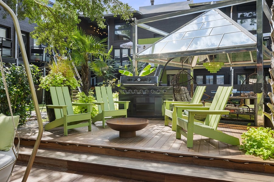 Enjoy your second wellness Resort style courtyard @ 6011 Gaston Ave with striped umbrellas and garden paths. Wellness products available for our residents.