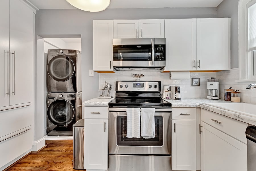 Convenience at its best with a full-sized LG washer and dryer in the kitchen.