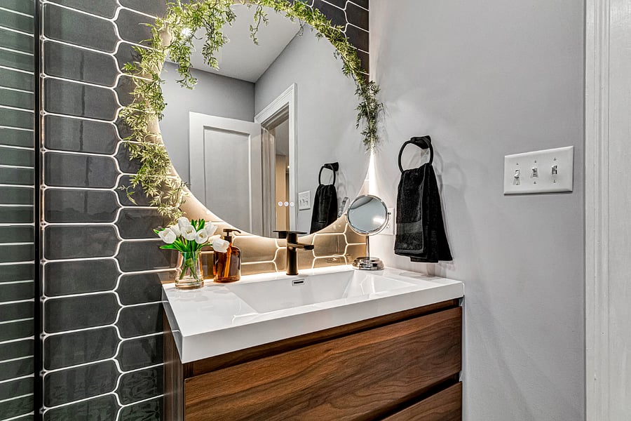 Thoughtfully designed vanity with a large mirror and plenty of space to get ready.