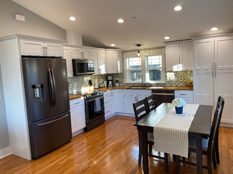 All new Samsung appliances. Kitchen table seats 6, two extra chairs stored in the closet.