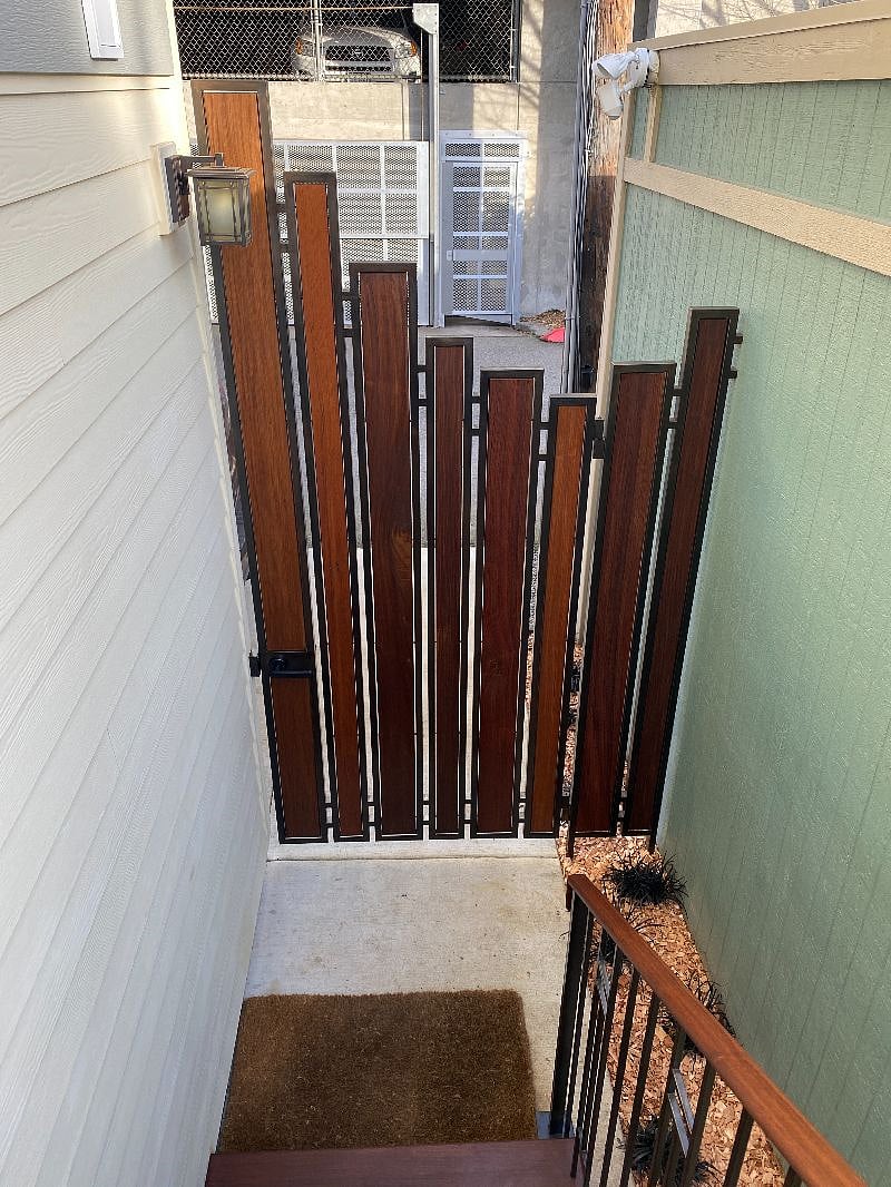 9 tall handmade gate provides a secure entrance.