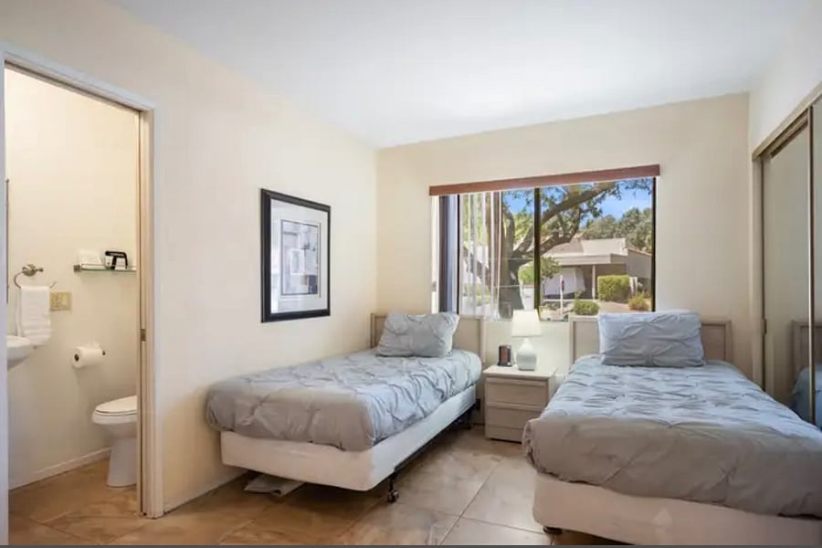 2nd bedroom with twin beds and full bathroom