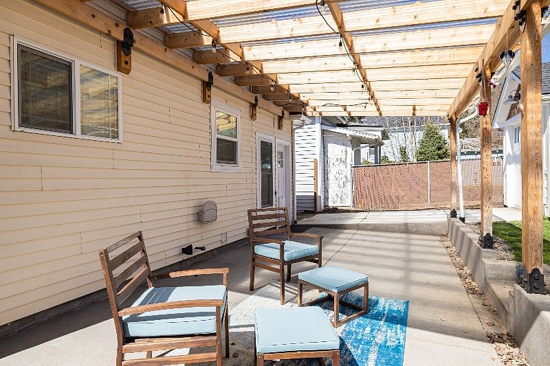 covered patio looking towards driveway.