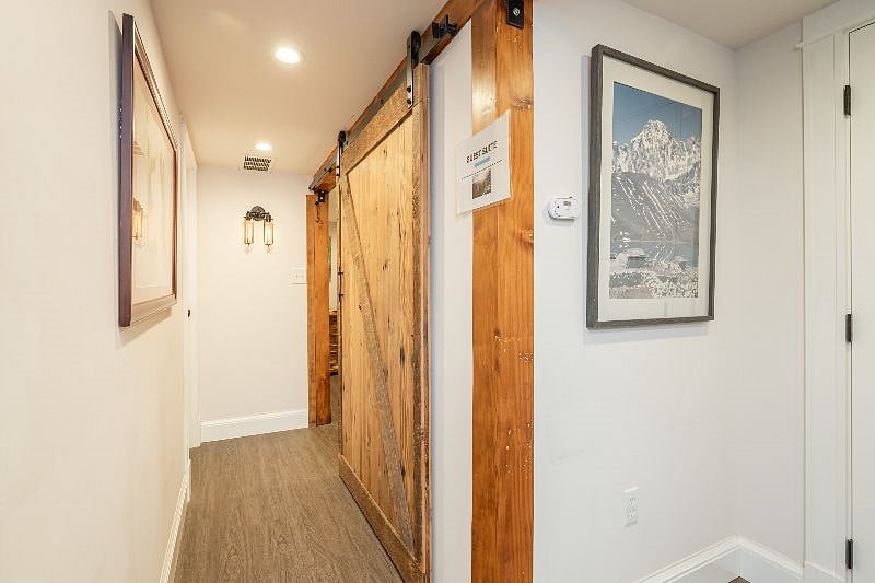 Hallway to guest suite (behind the barn door)