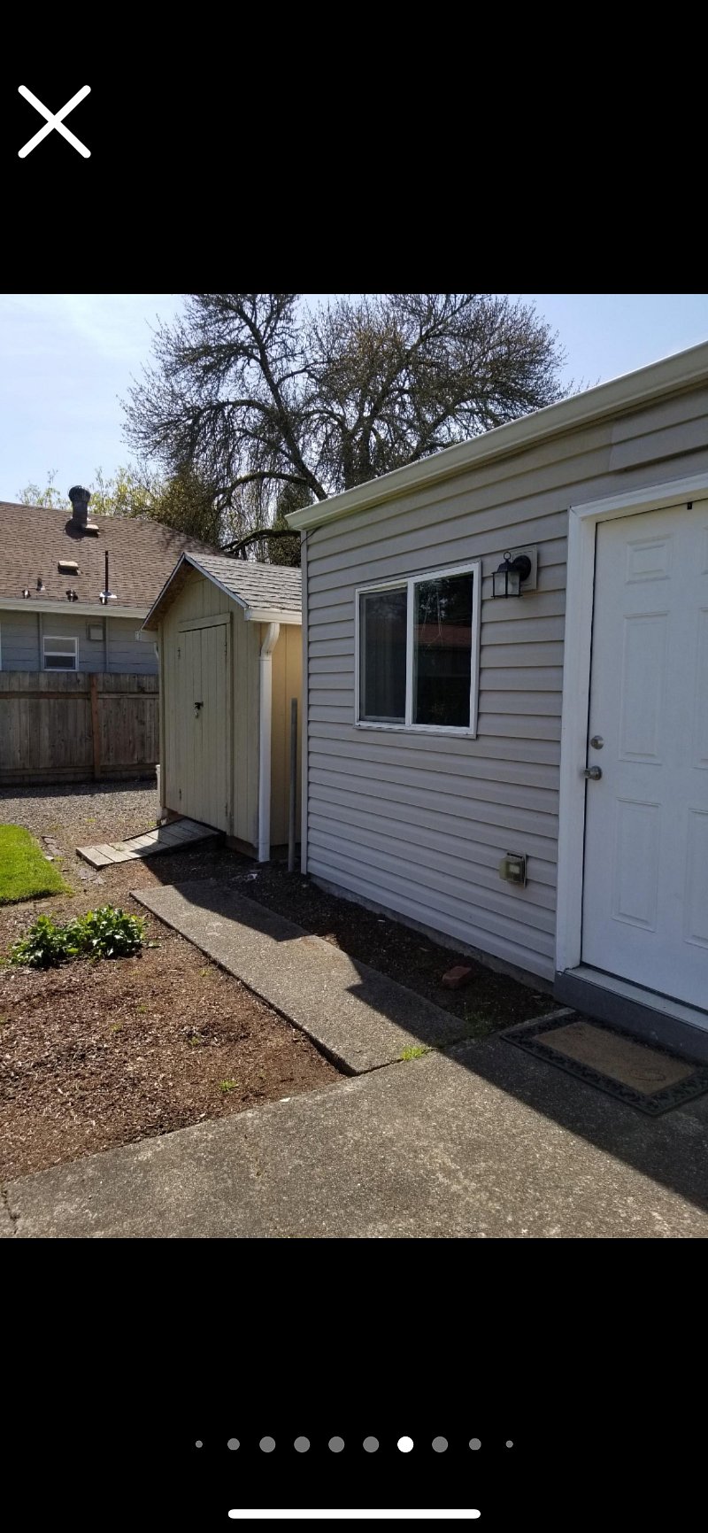 Back entrance from fenced backyard.