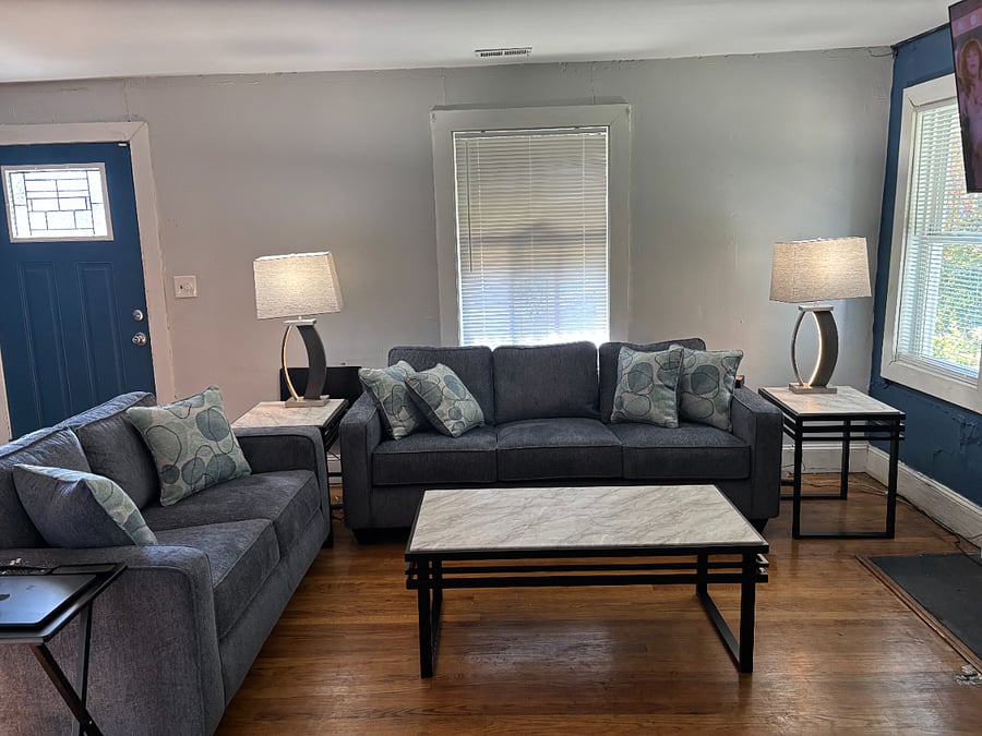Living Room with 55 inch Smart TV and Fireplace