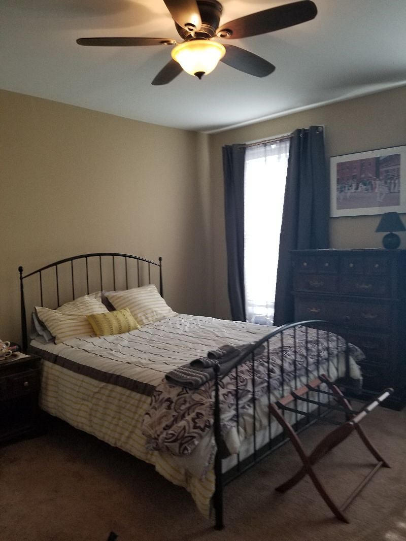 Third floor rear, nonworking fireplace, device ready flat screen tv, bed linens, towels, and blackout curtains.Traditional lock on your bedroom door.