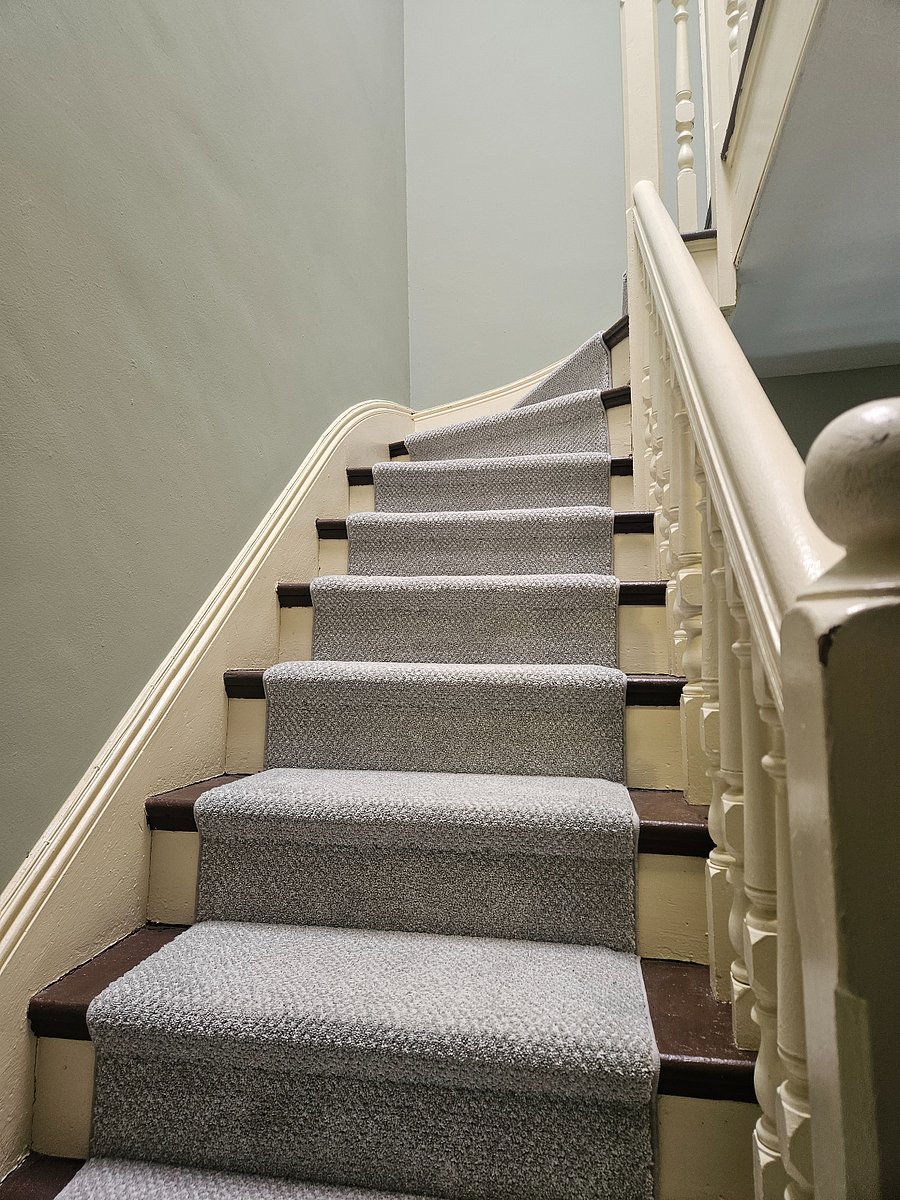 Stair case leading to 3rd floor bedrooms.