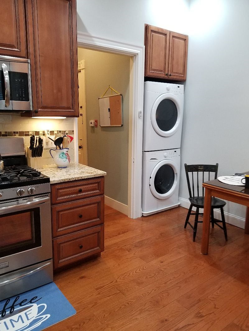 Stackad washer and dryer located in the kitchen. A 2nd washer and dryer is located in the basement. Available to all tennants.