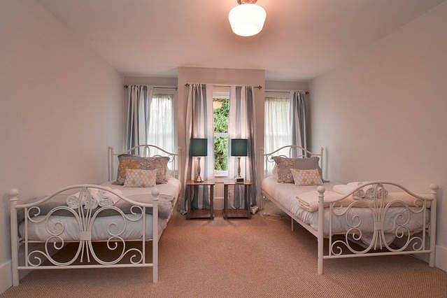 The photo shows twin beds but can be configured with queen or you are welcome to bring you own. 