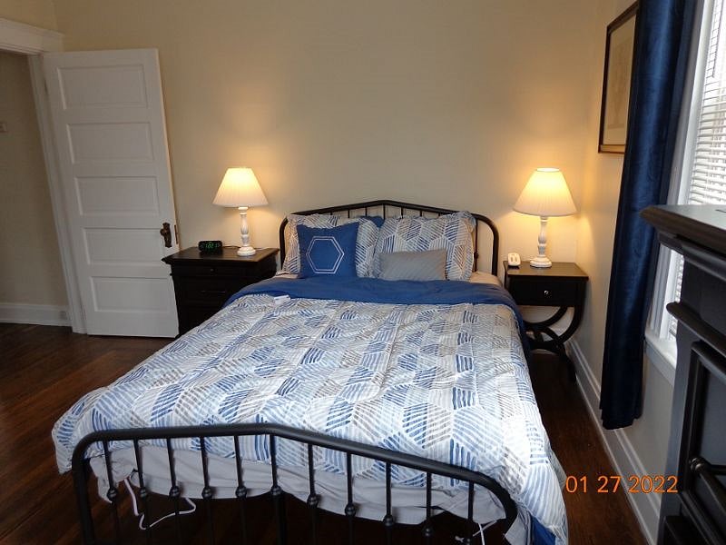 Plenty of storage: tall dresser, short dresser, two nightstands and a closet. 