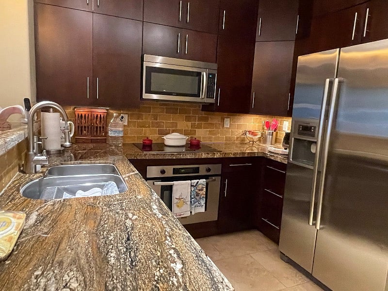 Kitchen with upgraded appliances, dishwasher, microwave, fridge, garbage disposal, Island area too. 