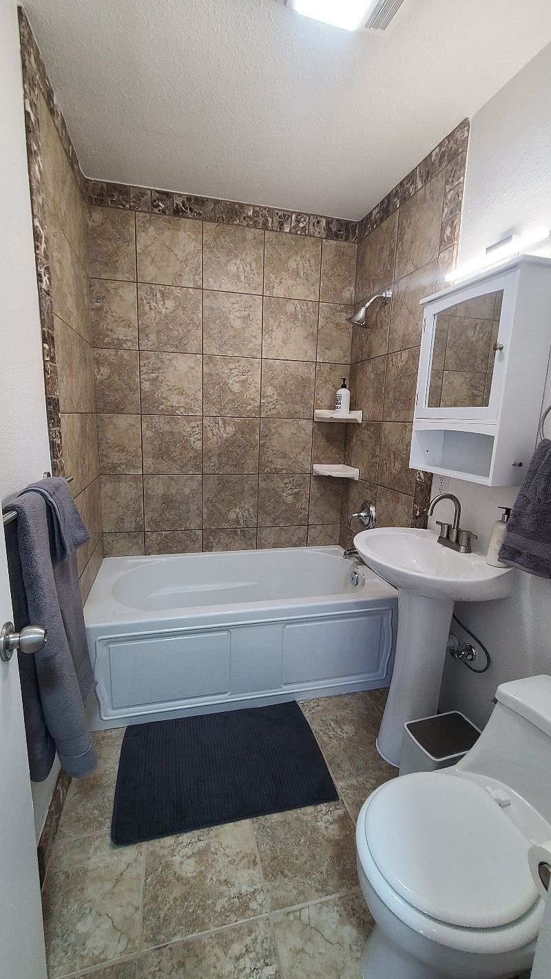 Full bath with shower and tub