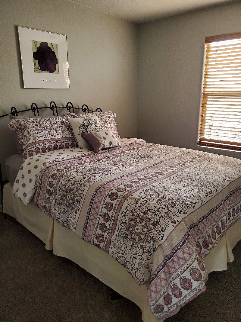 Second bedroom features a queen bed and a roomy closet.