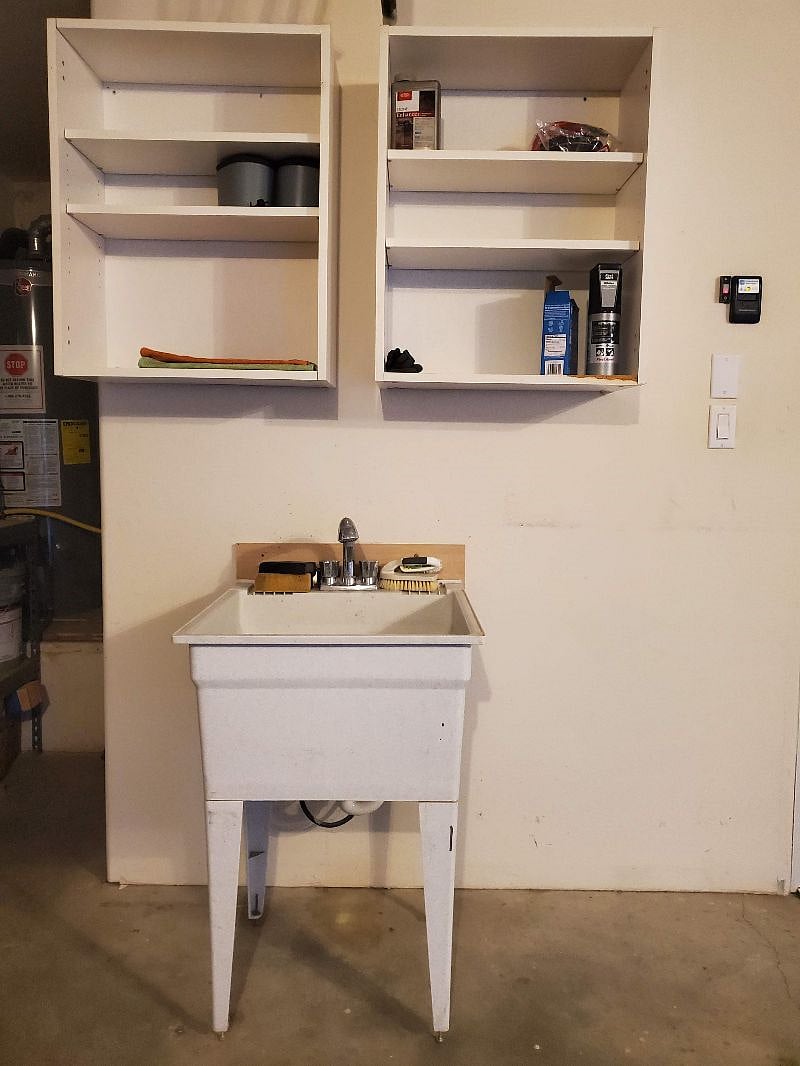 The door garage also has a handy sink and plenty of storage.