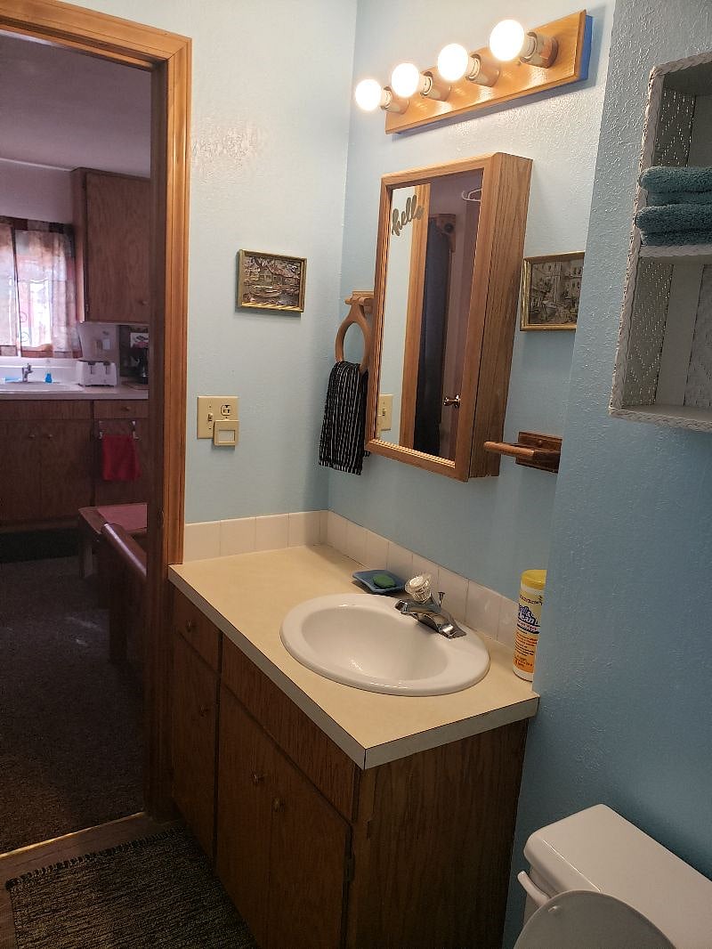 Looking out bathroom from shower.