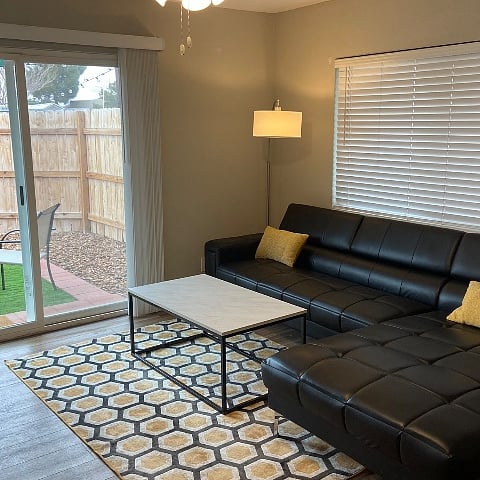 The living room spills out to the southerly facing courtyard.