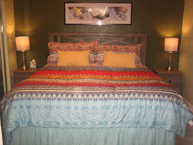 View of bedroom with king size bed