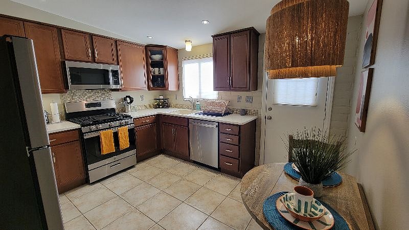 Fully stocked kitchen - Includes stainless steel appliances. 