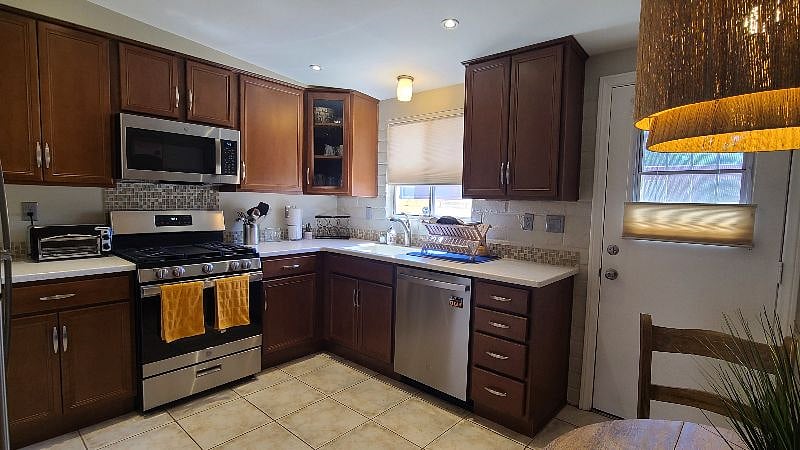 Fully stocked kitchen - Includes stainless steel appliances. 