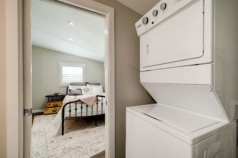 In-unit laundry tucked away behind the pocket door