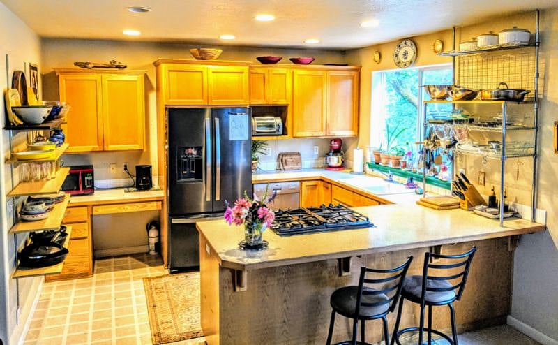Enjoy the fully equipped kitchen, gas range, and premier appliances and gadgets