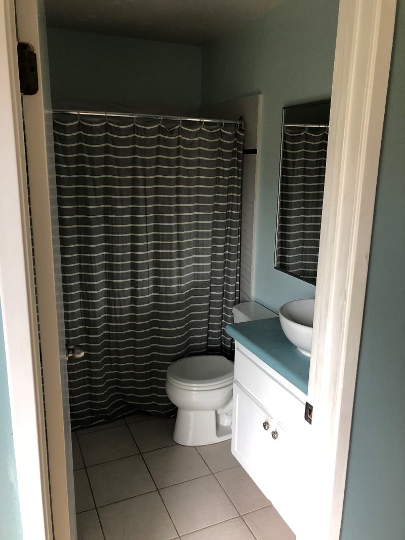 Bedroom #2- personal bathroom, with sink, toilet, and shower/tub