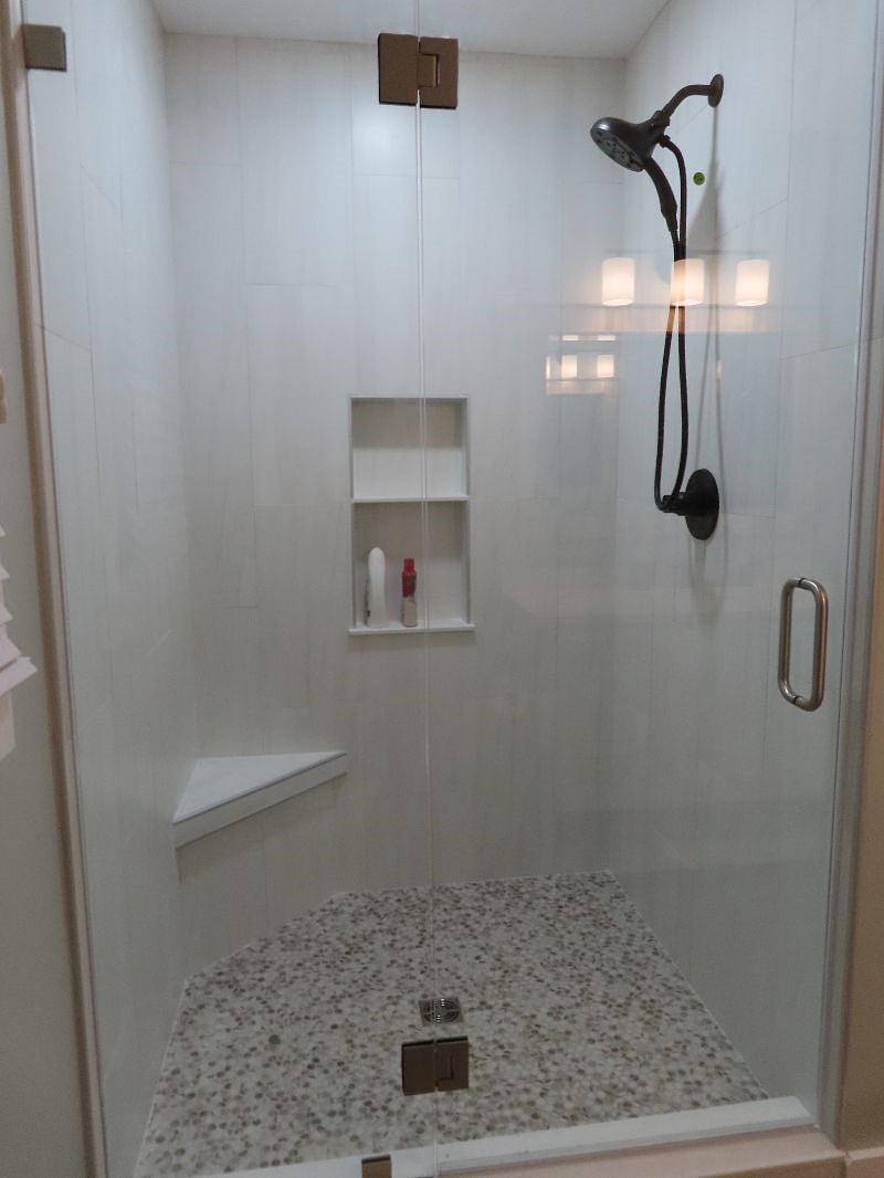 Modern shower with head and wand.