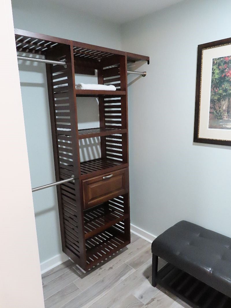 Walk-in closet with more storage than you'll need.