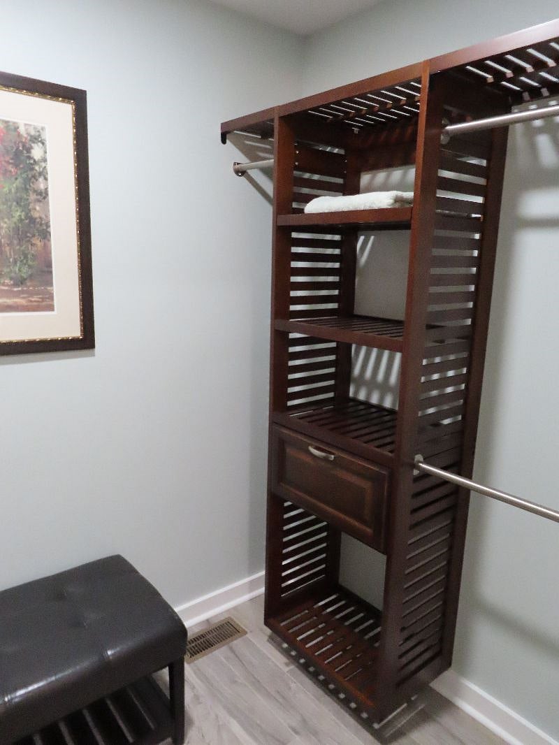 Walk-in closet with more storage than you'll need.