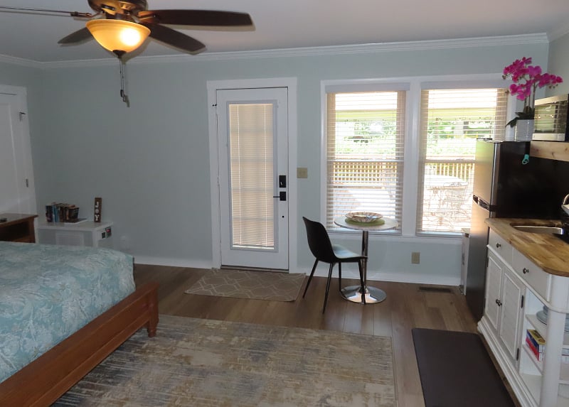 Small table with view into back yard.