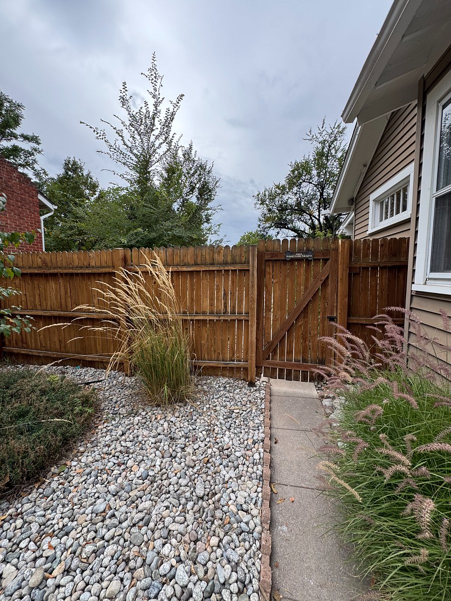 entrance gate from front of property with off street driveway parking (included in rental price)