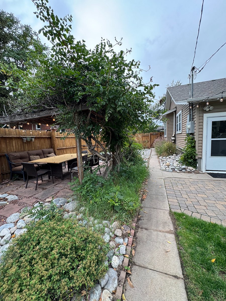 view of back door entrance - accessible from either stand alone garage or front gate