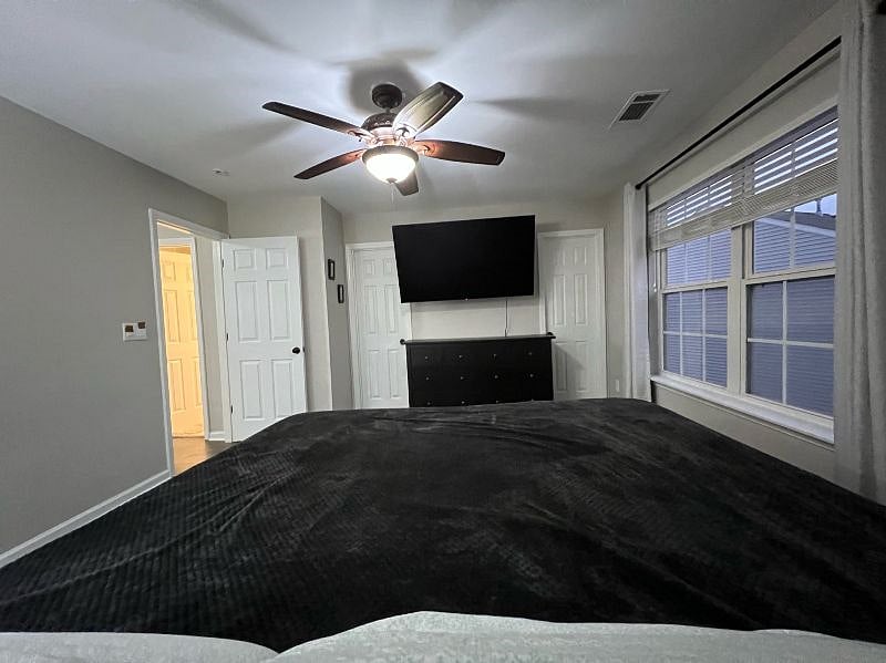 75" 4K OLED with Blackout Curtains - Master Bedroom (2nd Floor)