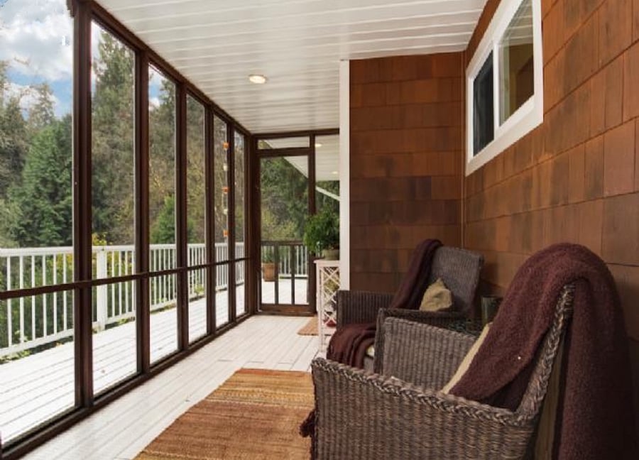 The south facing and creek facing screened in porch for coffee porch time or evening relaxing to the sound of the creek and crickets.