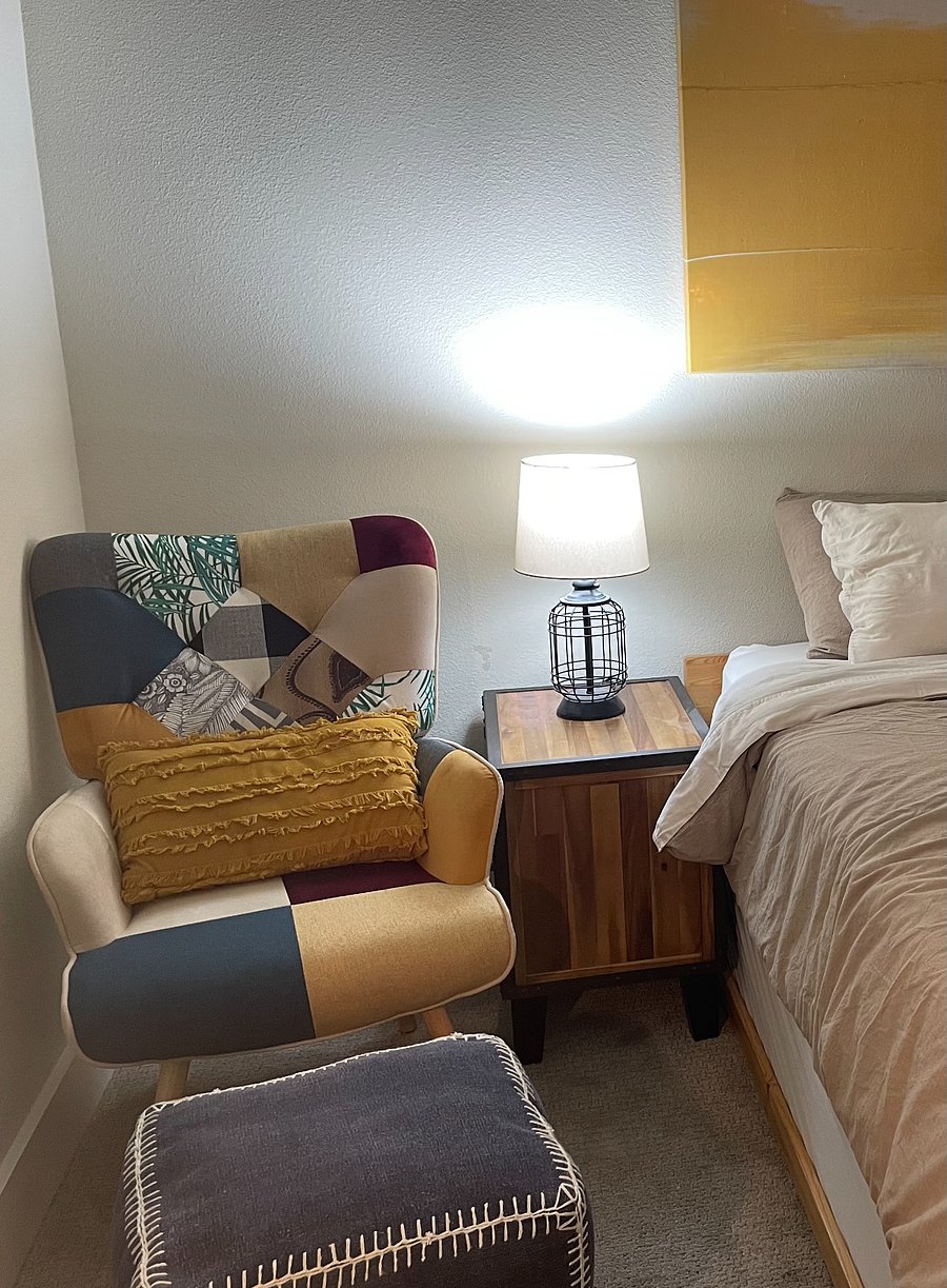 lounge chair @ queen bedroom