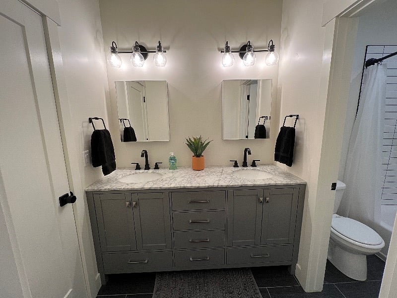 Double vanities with separate shower area