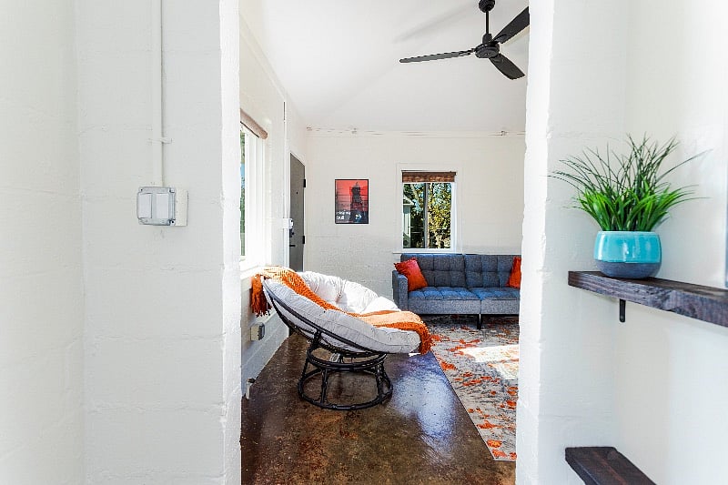 View from the hallway toward the living room. Note polished concrete floors throughout this "loft-styled" apartment. 