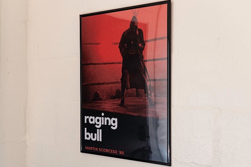 Custom movie posters that were made "exclusively" for your unit, decorate the walls.