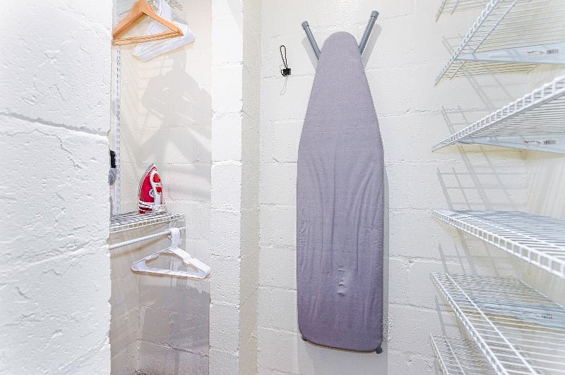 Walk-in closet interior with plenty of shelf space for long stays in your home away from home.