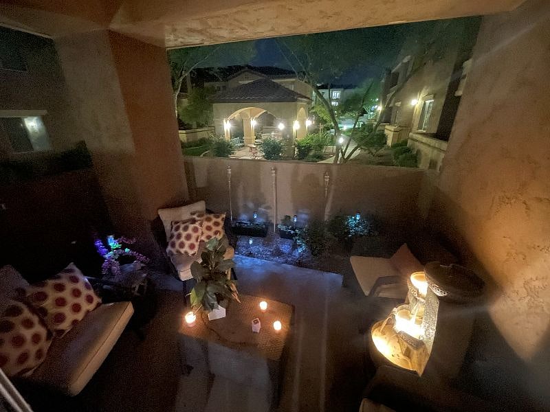 Patio with palm style ceiling fan 