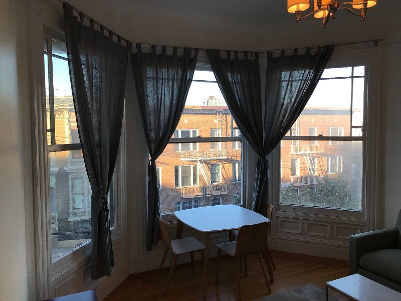 Partial downtown city views from dining room/living room