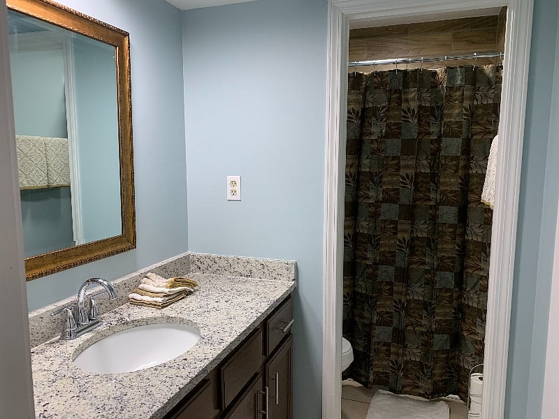 The home has two full bathrooms with tub/shower. With granite counter tops and ceramic tile in the bath/shower.